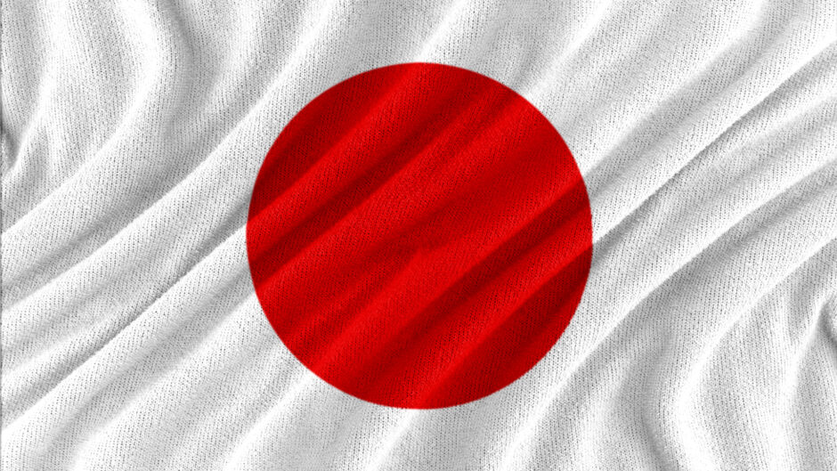 Flaga Japonii, która składa się z białego tła i dużej, czerwonej tarczy w centrum