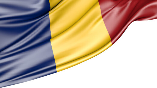 Flaga Rumunii, która jest symbolem narodowym, na białym tle